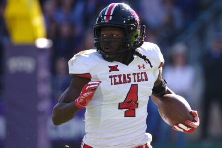 Texas Tech's running back SaRodorick Thompson (4) runs with the ball against TCU in a Big 12 football game, Saturday, Nov. 5, 2022, at Amon G. Carter Stadium in Fort Worth.