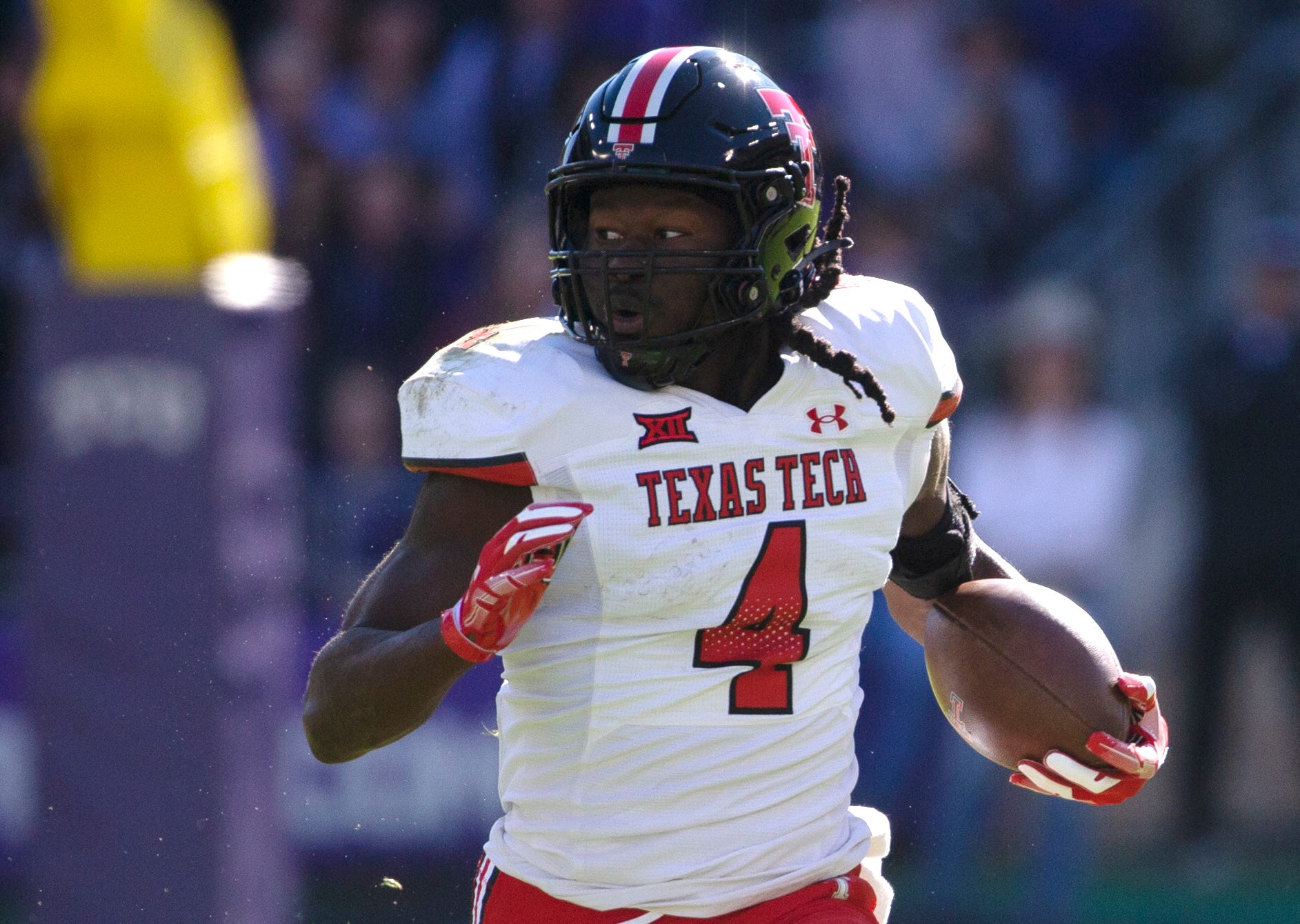 Texas Tech's running back SaRodorick Thompson (4) runs with the ball against TCU in a Big 12 football game, Saturday, Nov. 5, 2022, at Amon G. Carter Stadium in Fort Worth.