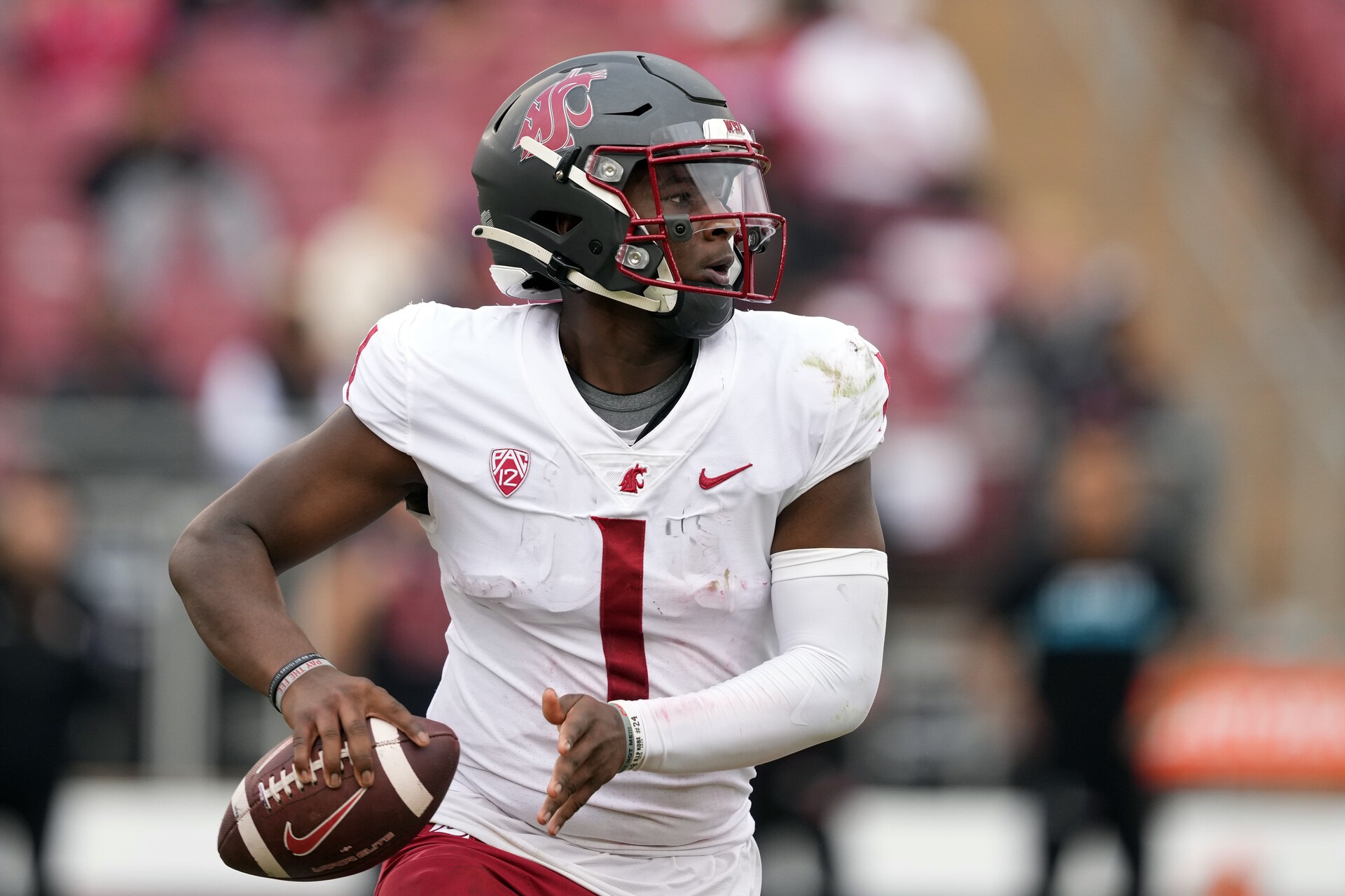 Washington State Cougars quarterback Cameron Ward (1) looks to pass against the Stanford Cardinal during the third quarter at Stanford Stadium.