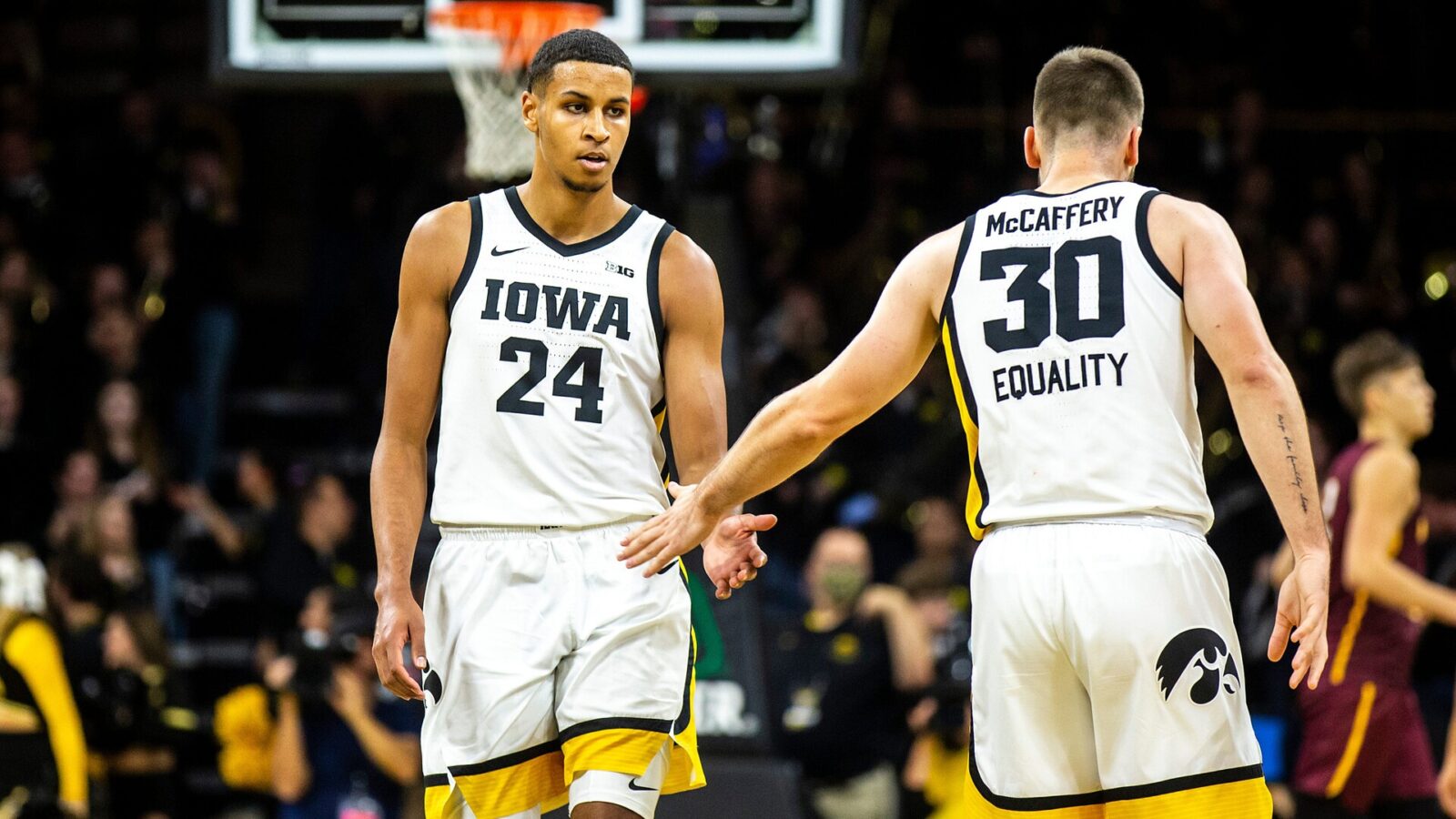 Iowa forward Kris Murray, left, high-fives guard Connor McCaffery during a NCAA men's basketball game against Bethune-Cookman, Monday, Nov. 7, 2022, at Carver-Hawkeye Arena in Iowa City, Iowa.