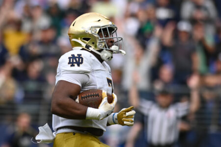 Notre Dame Fighting Irish running back Audric Estime (7) reacts after scoring a first quarter touchdown against the Navy Midshipmen at M&T Bank Stadium.