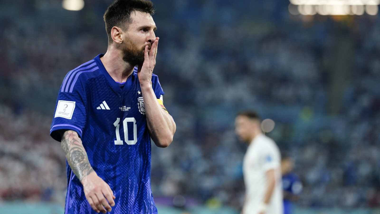 Argentina forward Lionel Messi (10) reacts during the second half against Poland in a group stage match during the 2022 World Cup at Stadium 974.