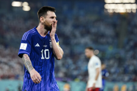 Argentina forward Lionel Messi (10) reacts during the second half against Poland in a group stage match during the 2022 World Cup at Stadium 974.