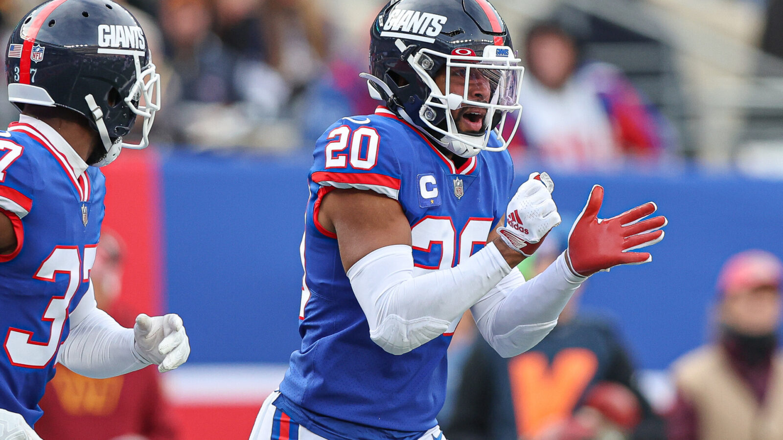 New York Giants safety Julian Love (20) celebrates a defensive stop during the first half against the Washington Commanders at MetLife Stadium.