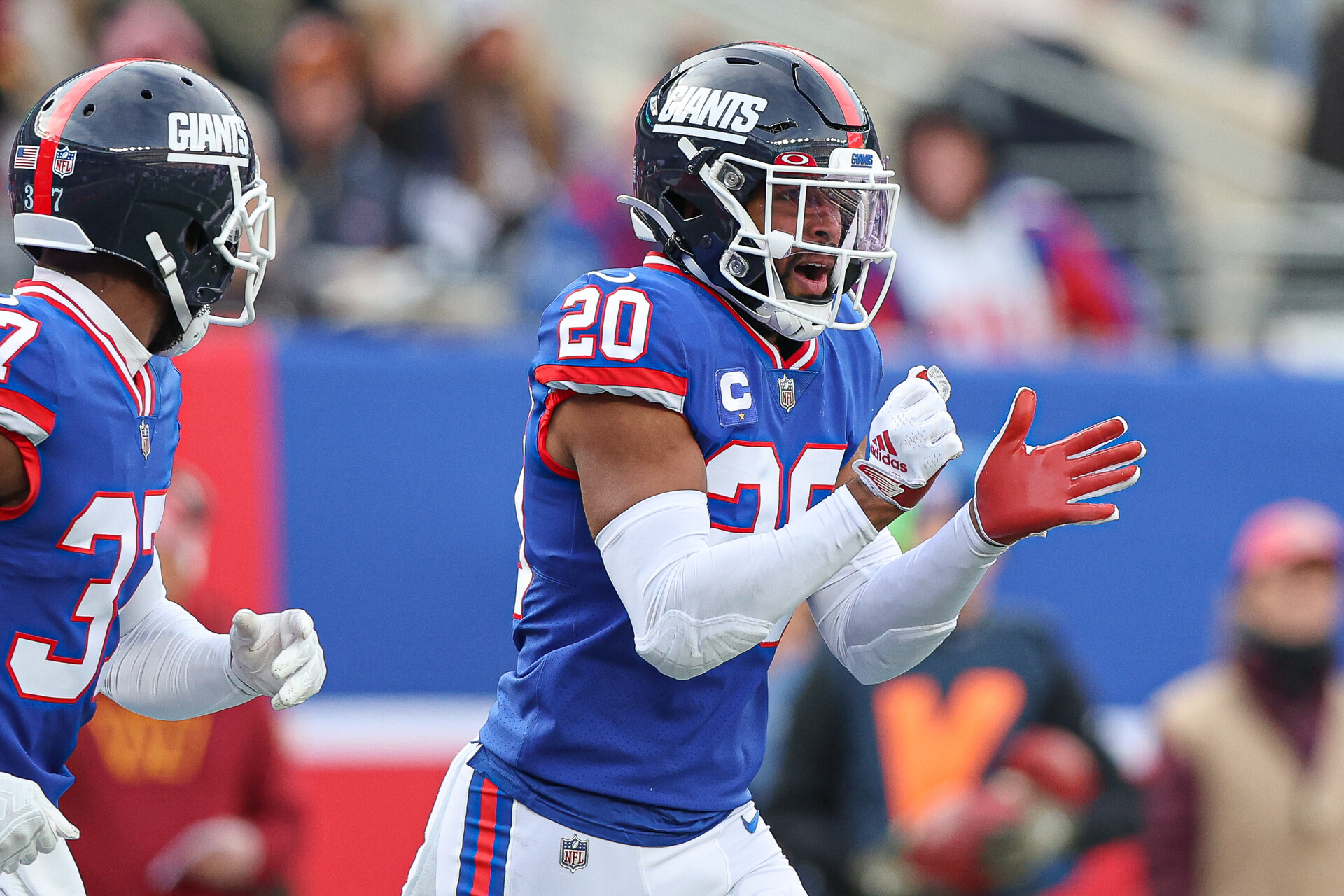 New York Giants safety Julian Love (20) celebrates a defensive stop during the first half against the Washington Commanders at MetLife Stadium.