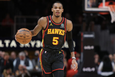Atlanta Hawks guard Dejounte Murray (5) dribbles against the Oklahoma City Thunder in the first quarter at State Farm Arena.