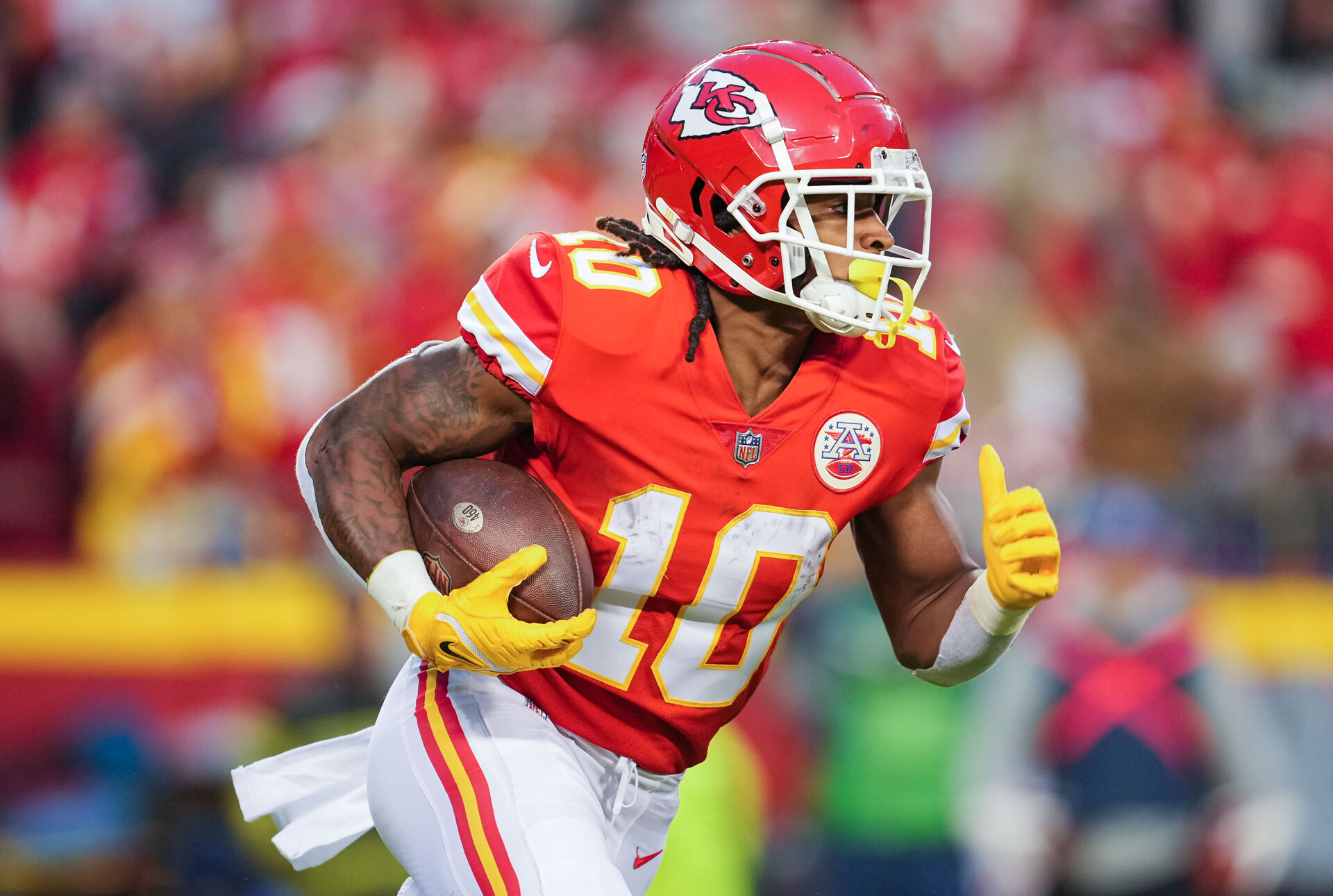 Kansas City Chiefs running back Isiah Pacheco (10) runs the ball during the first half against the Los Angeles Rams at GEHA Field at Arrowhead Stadium.