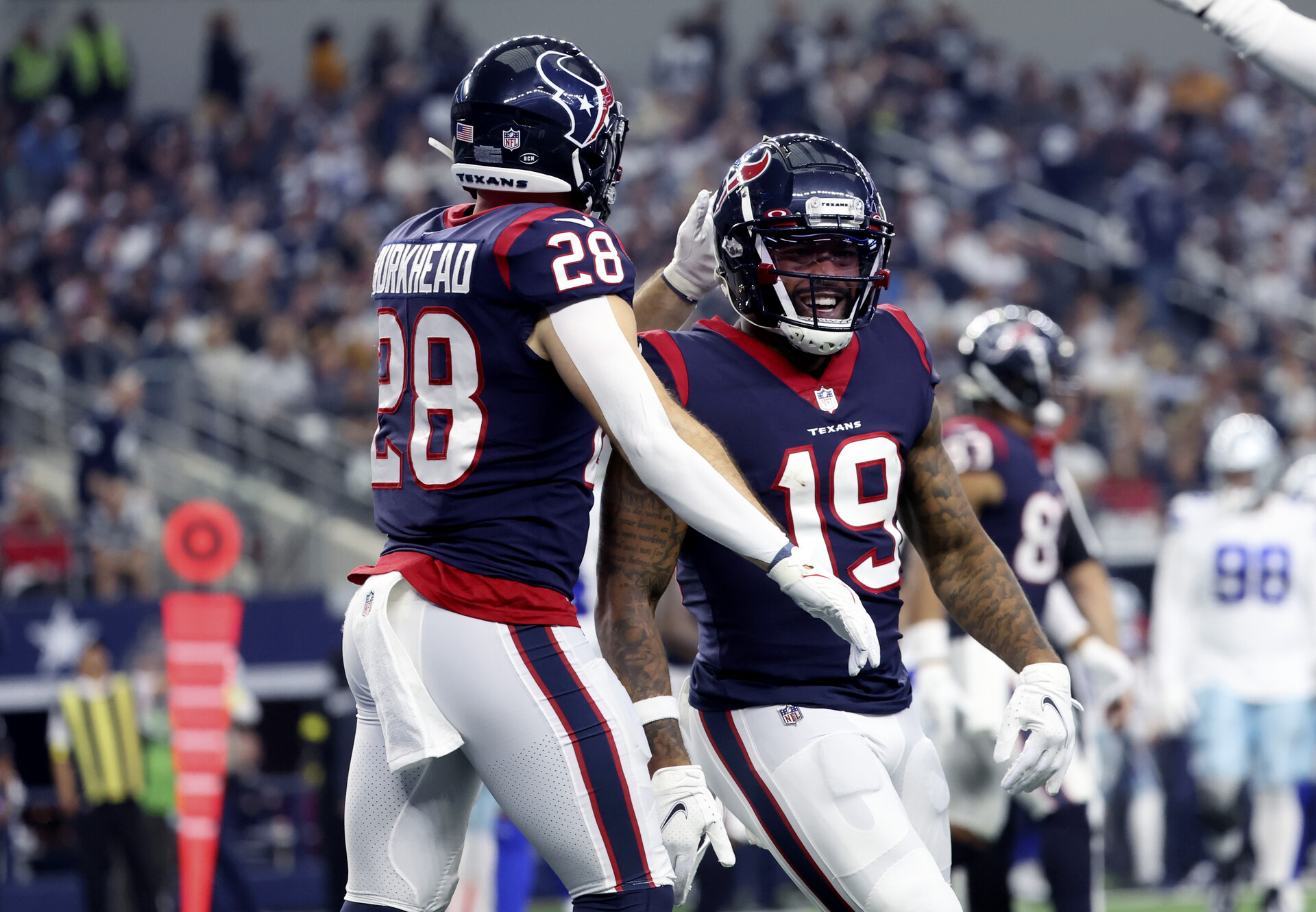 Dec 11, 2022; Arlington, Texas, USA; Houston Texans wide receiver Amari Rodgers (19) celebrates with Houston Texans running back Rex Burkhead (28) after catching a touchdown pass during the first half against the Dallas Cowboys at AT&T Stadium.