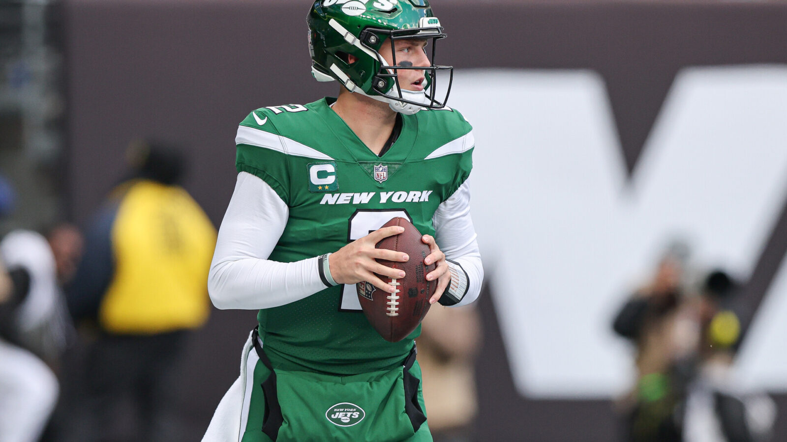 New York Jets quarterback Zach Wilson (2) drops back to pass during the first quarter against the Detroit Lions at MetLife Stadium.