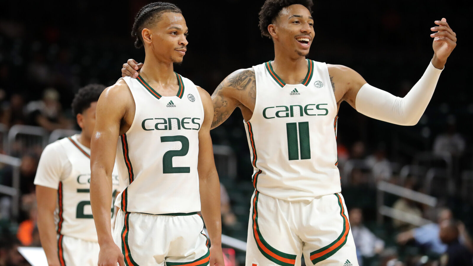 CORAL GABLES, FLORIDA - NOVEMBER 15: Isaiah Wong #2 and Jordan Miller #11 of the Miami (Fl) Hurricanes talk on the court during the first half against the Florida A&M Rattlers at Watsco Center on November 15, 2022 in Coral Gables, Florida.