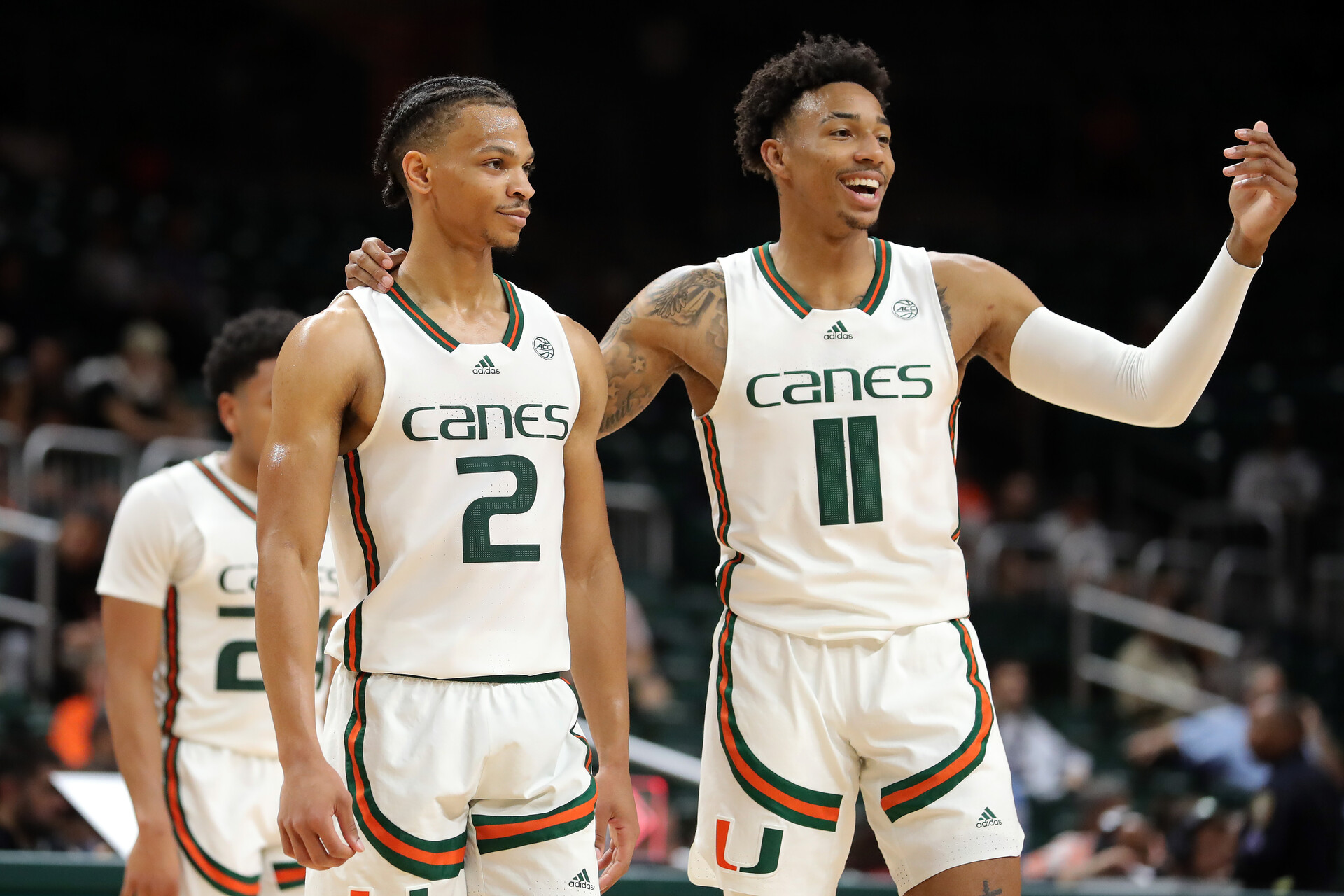 CORAL GABLES, FLORIDA - NOVEMBER 15: Isaiah Wong #2 and Jordan Miller #11 of the Miami (Fl) Hurricanes talk on the court during the first half against the Florida A&M Rattlers at Watsco Center on November 15, 2022 in Coral Gables, Florida.