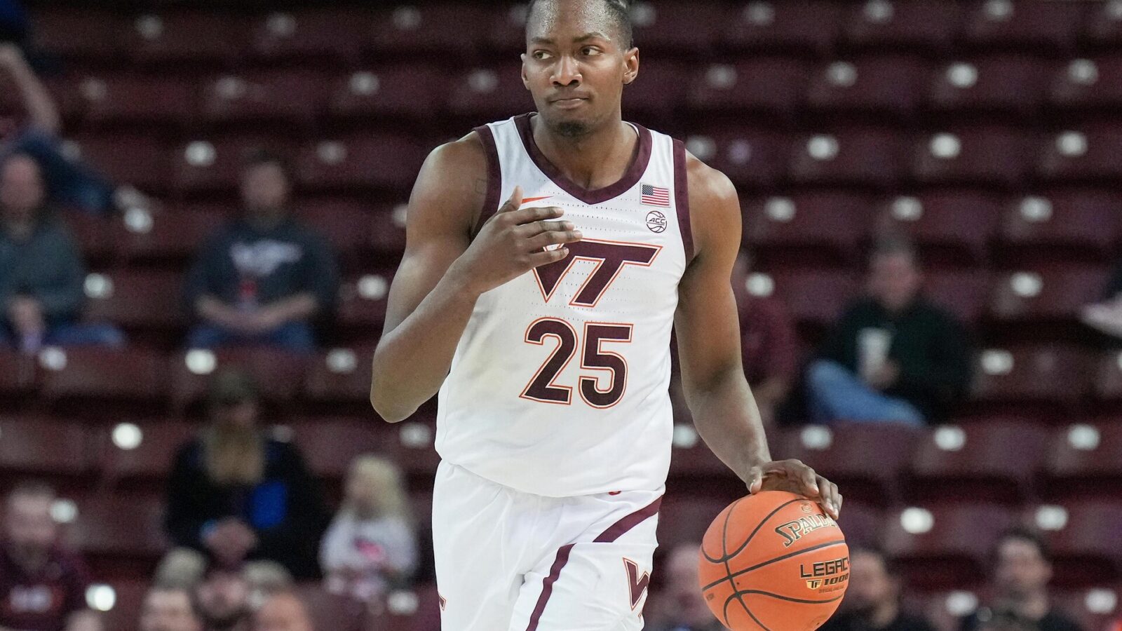 Virginia Tech Hokies forward Justyn Mutts (25) brings the ball up court in the first half against the Penn State Nittany Lions at TD Arena.