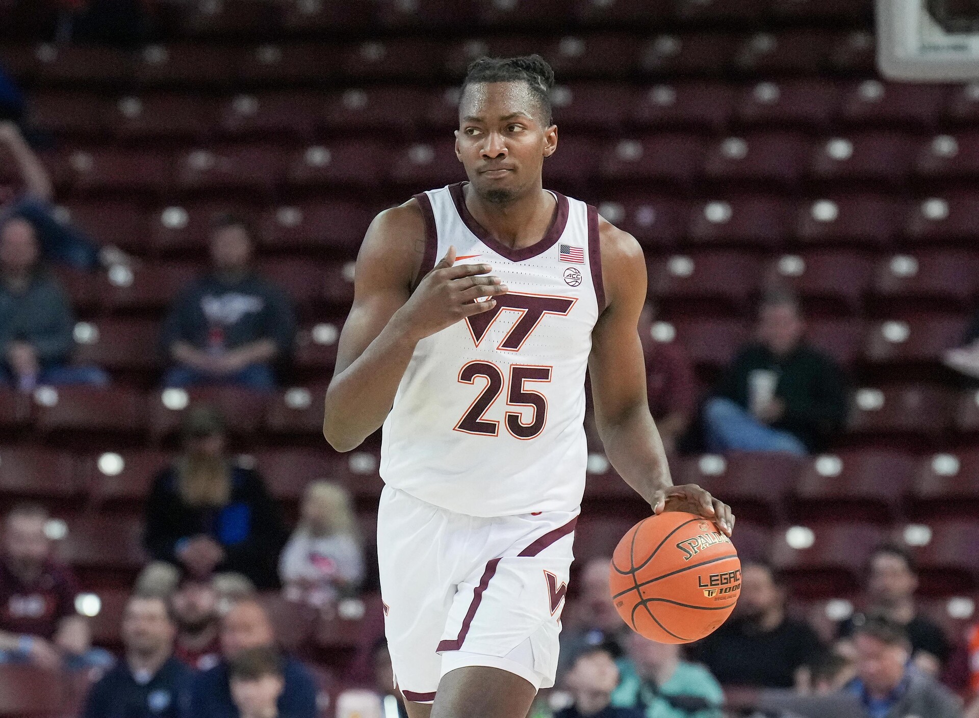 Virginia Tech Hokies forward Justyn Mutts (25) brings the ball up court in the first half against the Penn State Nittany Lions at TD Arena.