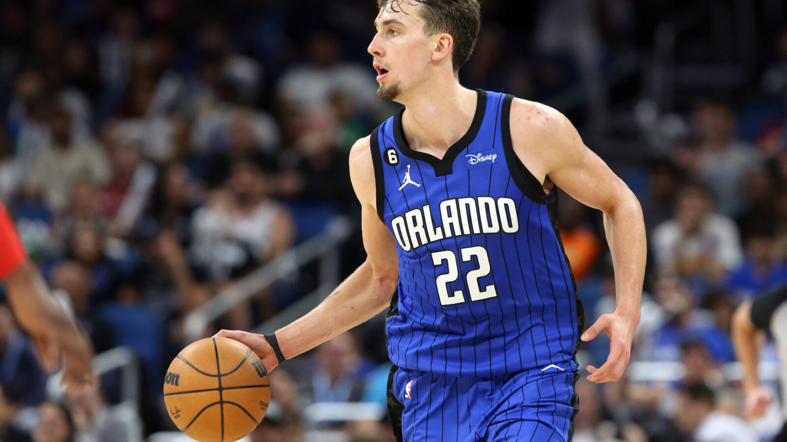 Magic forward Franz Wagner (22) drives to the basket against the Philadelphia 76ers during the second half at Amway Center.