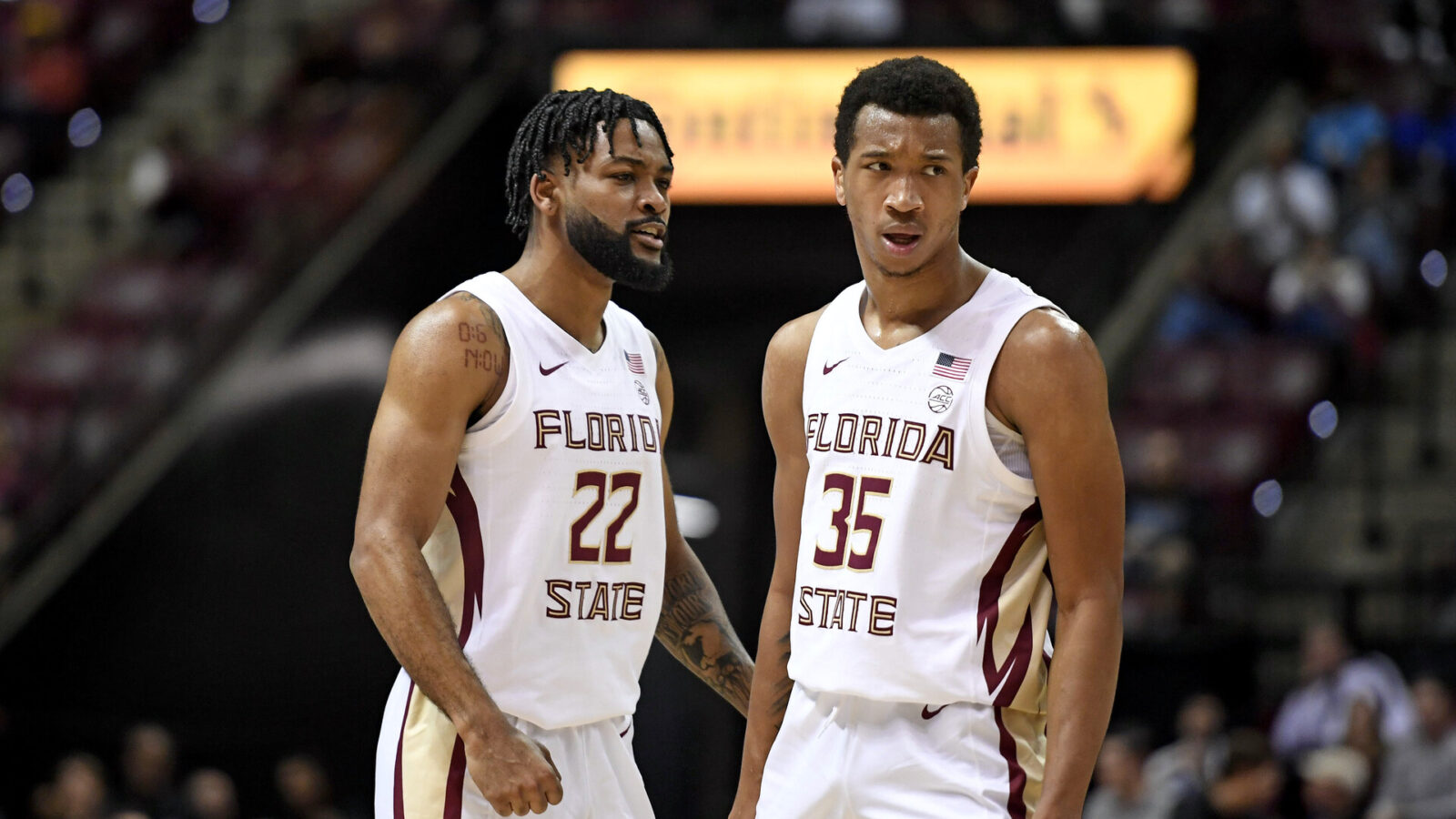 Florida State Seminoles guard Matthew Cleveland (35) and Darin Green Jr. (22) react to a play during the first half against the Purdue Boilermakers at Donald L. Tucker Center.