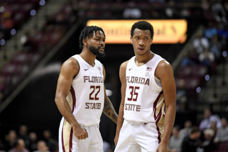 Florida State Seminoles guard Matthew Cleveland (35) and Darin Green Jr. (22) react to a play during the first half against the Purdue Boilermakers at Donald L. Tucker Center.