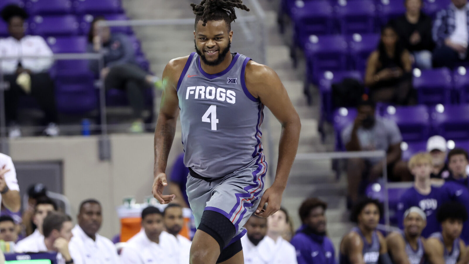 TCU Horned Frogs center Eddie Lampkin Jr. (4) reacts after scoring during the second half against the Jackson State Tigers at Ed and Rae Schollmaier Arena.