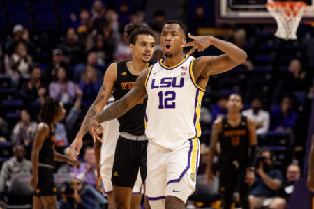 LSU Tigers forward KJ Williams (12) reacts to making a three point basket in the final minute of the game against the Winthrop Eagles during the second half at Pete Maravich Assembly Center.