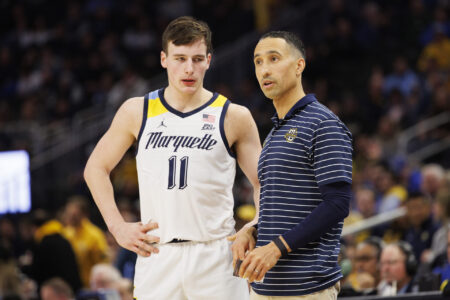 Marquette Golden Eagles head coach Shaka Smart talks with guard Tyler Kolek (11) during the game against the Creighton Bluejays at Fiserv Forum.