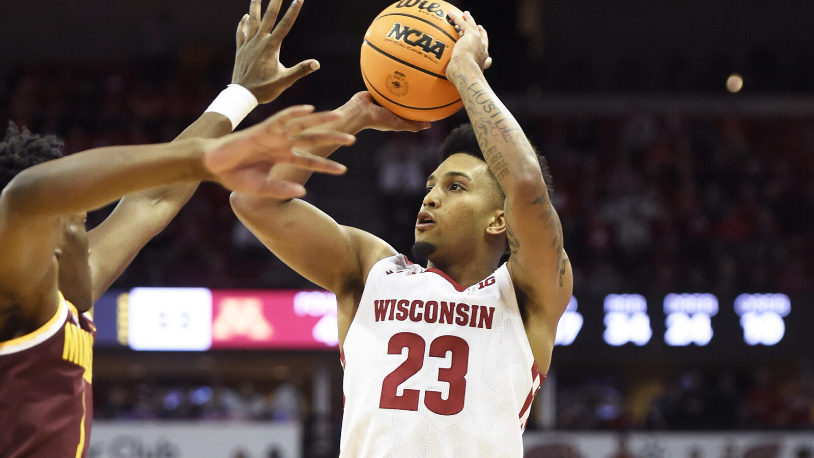 Wisconsin Badgers guard Chucky Hepburn (23) shoots the ball against the Minnesota Golden Gophers during the second half at the Kohl Center.