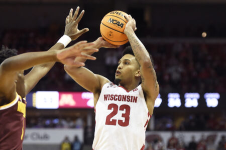 Wisconsin Badgers guard Chucky Hepburn (23) shoots the ball against the Minnesota Golden Gophers during the second half at the Kohl Center.