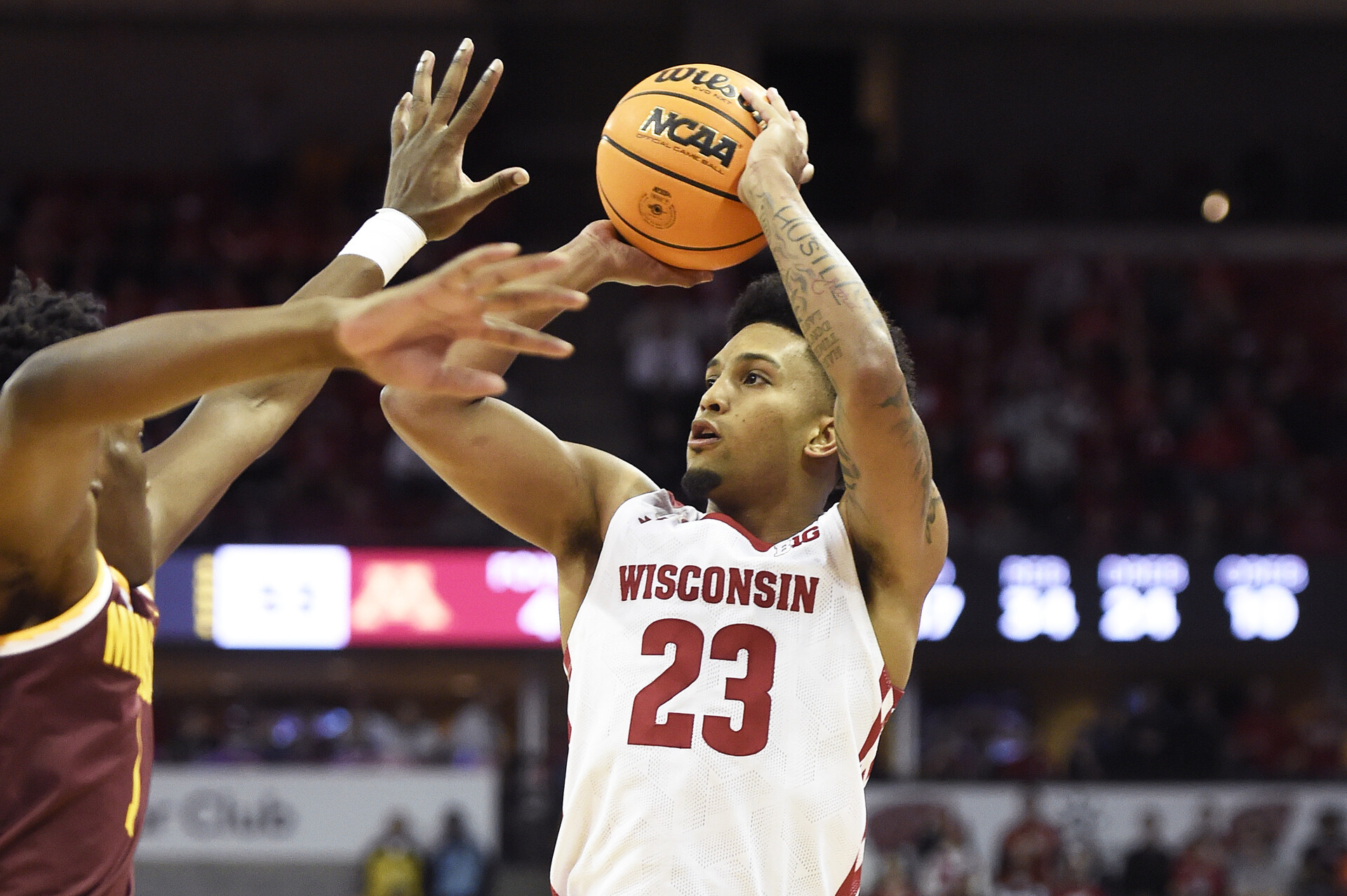 Wisconsin Badgers guard Chucky Hepburn (23) shoots the ball against the Minnesota Golden Gophers during the second half at the Kohl Center.
