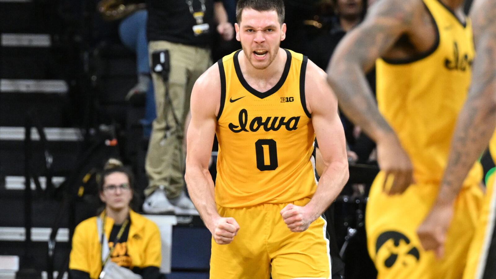 Iowa Hawkeyes forward Filip Rebraca (0) reacts after a basket against the Indiana Hoosiers during the first half at Carver-Hawkeye Arena.