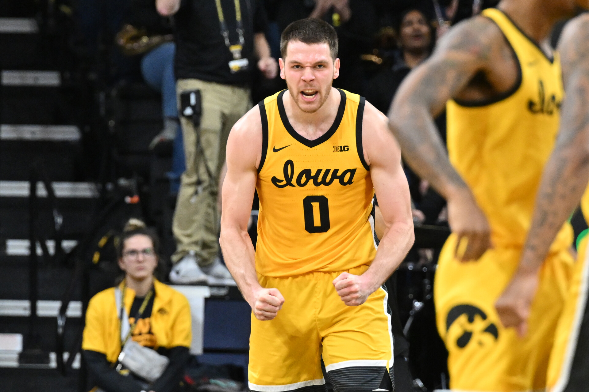Iowa Hawkeyes forward Filip Rebraca (0) reacts after a basket against the Indiana Hoosiers during the first half at Carver-Hawkeye Arena.