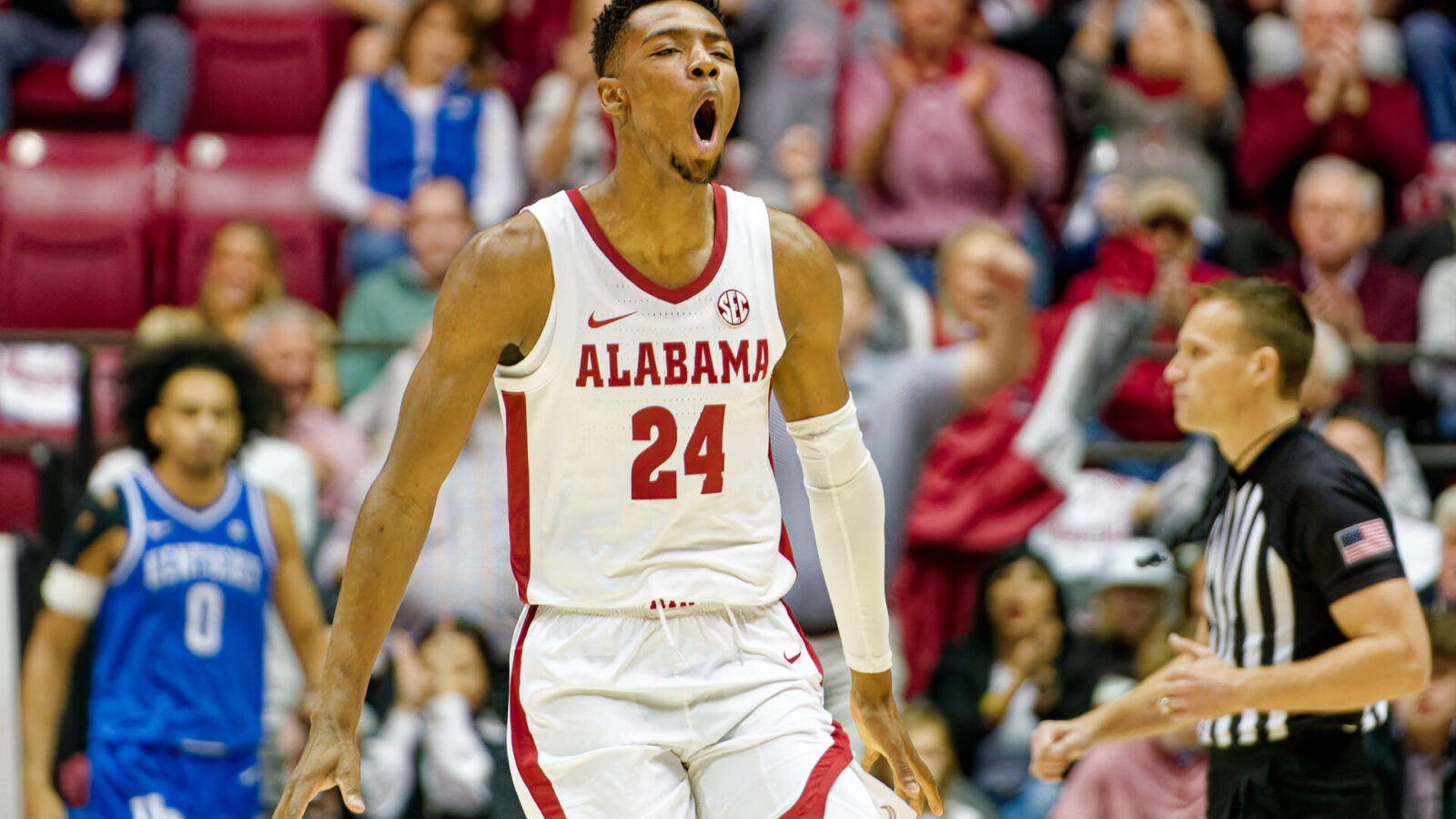 Alabama Crimson Tide forward Brandon Miller (24) reacts a after a play against the Kentucky Wildcats during first half at Coleman Coliseum.