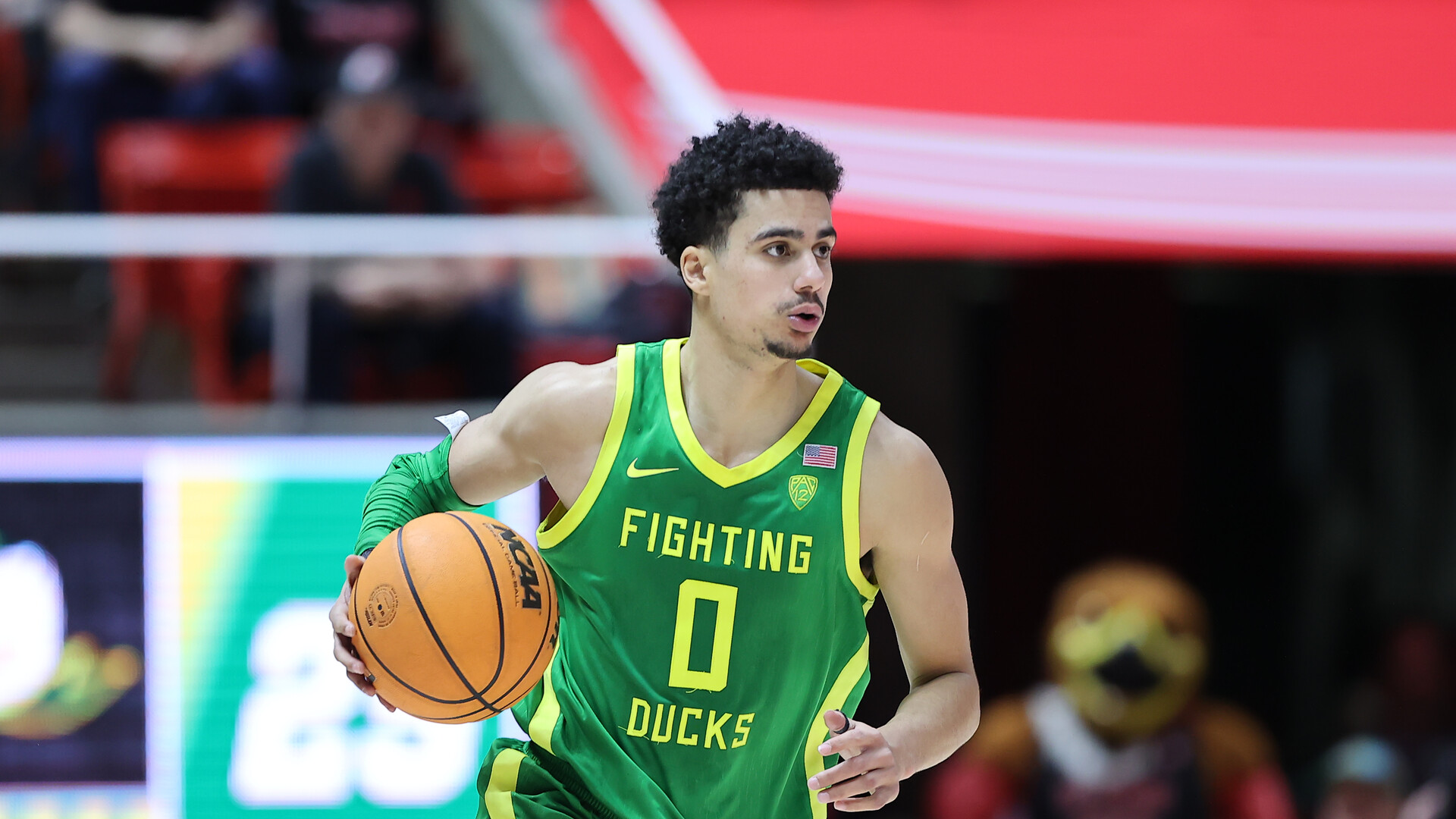 Oregon Ducks guard Will Richardson (0) brings the ball up the court against the Utah Utes in the first half at Jon M. Huntsman Center.