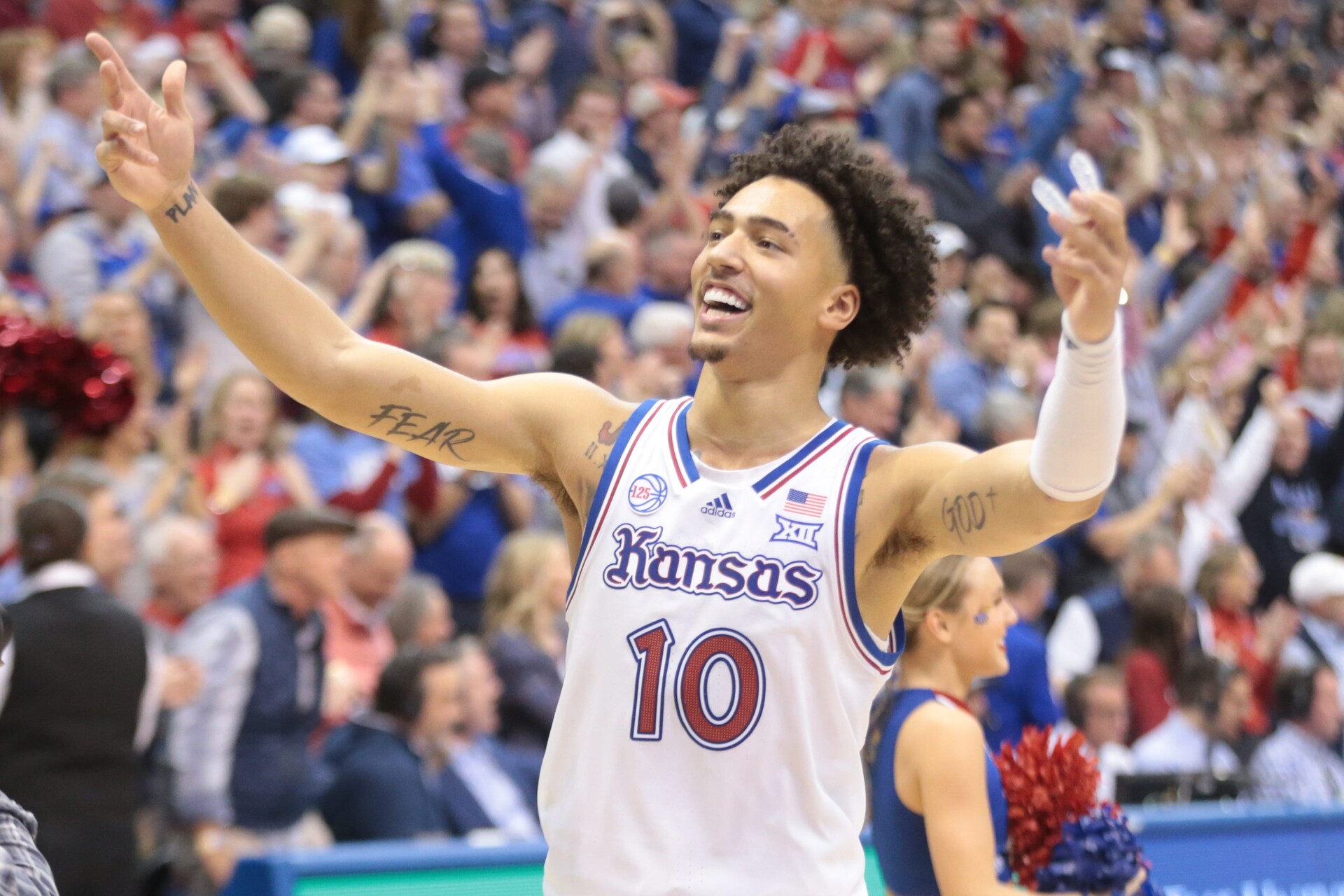Kansas redshirt junior forward Jalen Wilson (10) celebrates their 62-60 win over Iowa State Saturday inside Allen Fieldhouse.