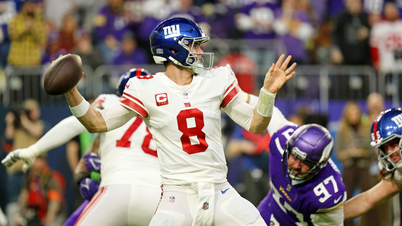 Jan 15, 2023; Minneapolis, Minnesota, USA; New York Giants quarterback Daniel Jones (8) passes the ball against the Minnesota Vikings during the first quarter of a wild card game at U.S. Bank Stadium.