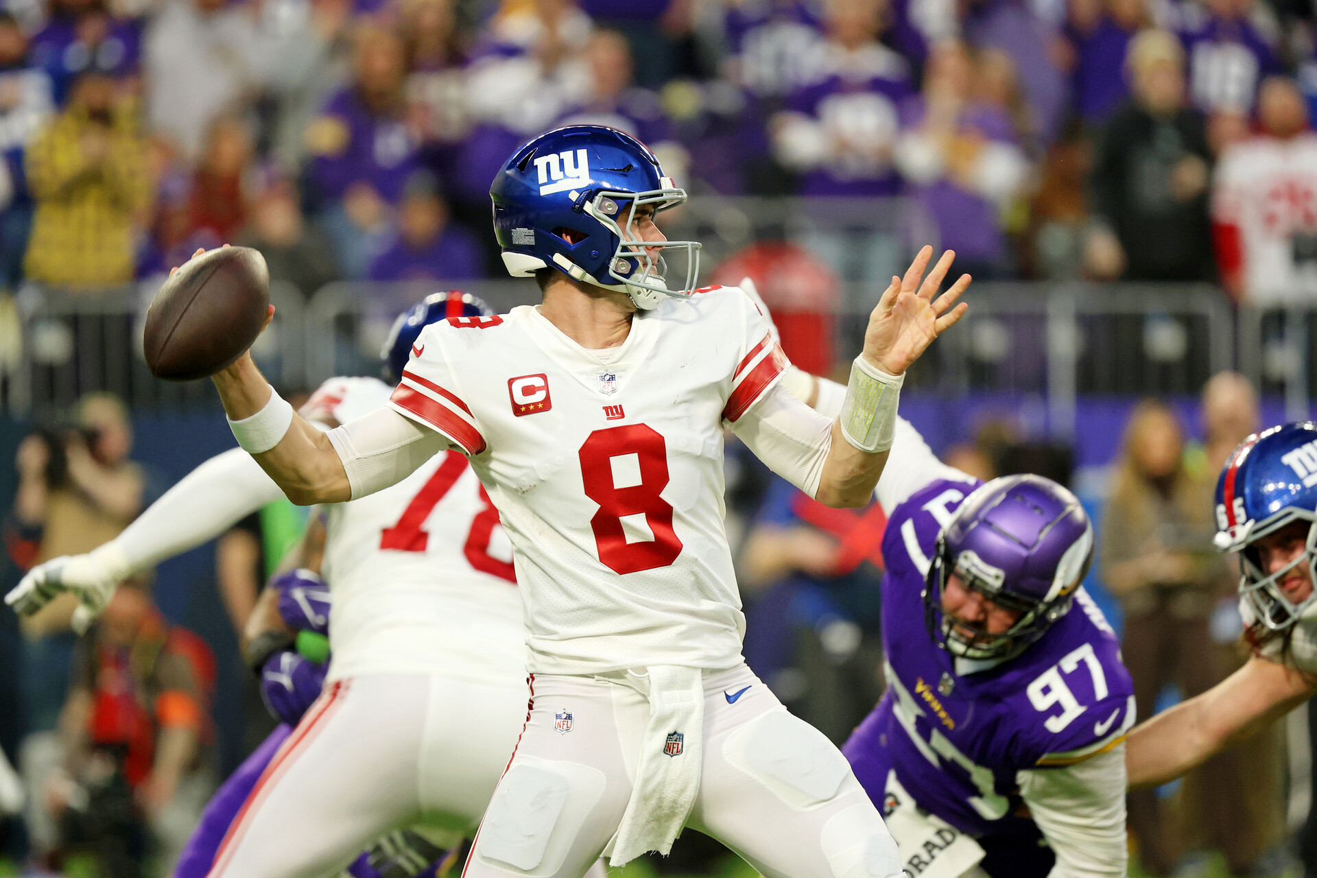 Jan 15, 2023; Minneapolis, Minnesota, USA; New York Giants quarterback Daniel Jones (8) passes the ball against the Minnesota Vikings during the first quarter of a wild card game at U.S. Bank Stadium.