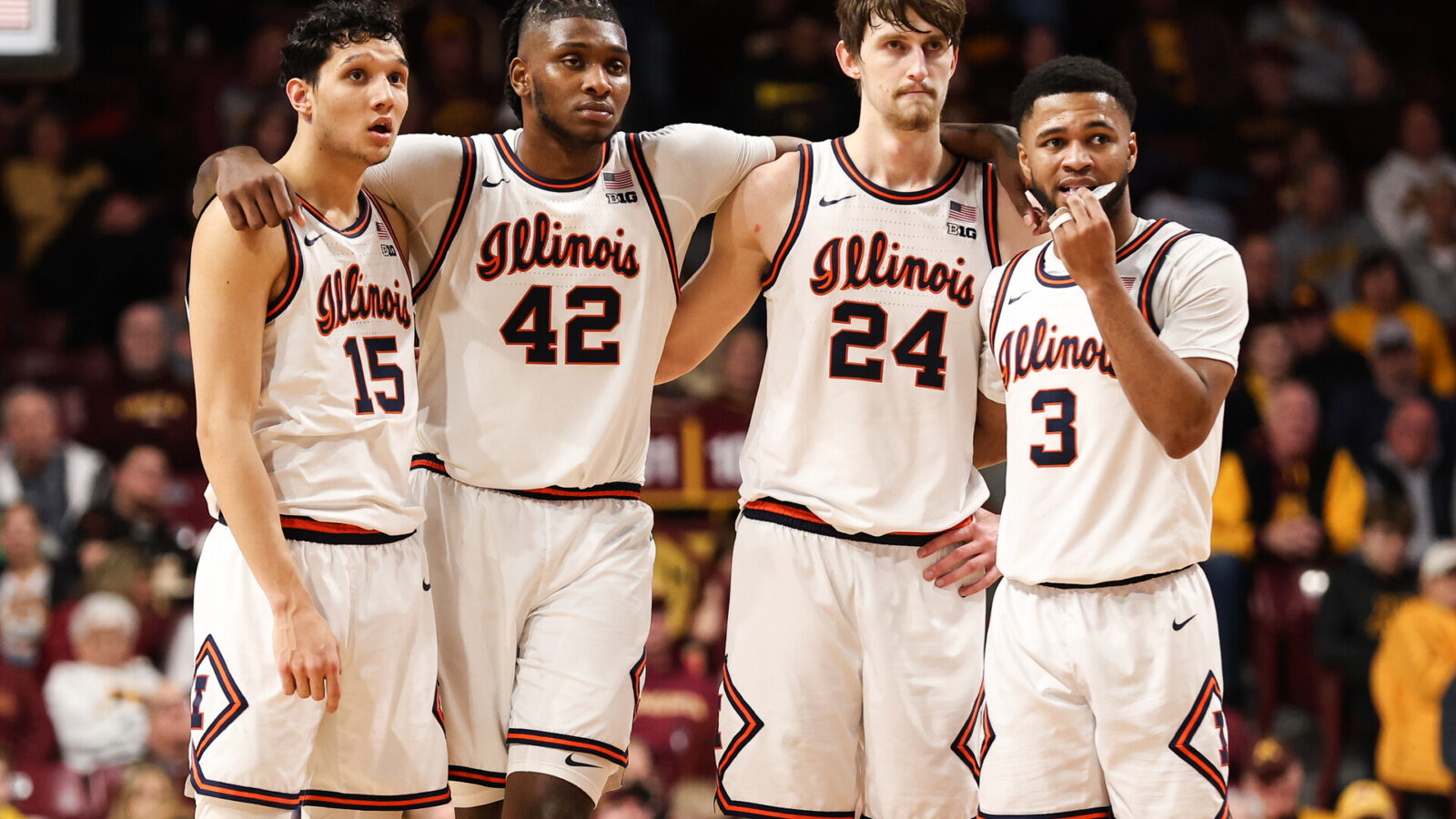 Jan 16, 2023; Minneapolis, Minnesota, USA; Illinois Fighting Illini guard RJ Melendez (15), forward Dain Dainja (42), forward Matthew Mayer (24), and guard Jayden Epps (3) looks on during the second half against the Minnesota Golden Gophers at Williams Arena.