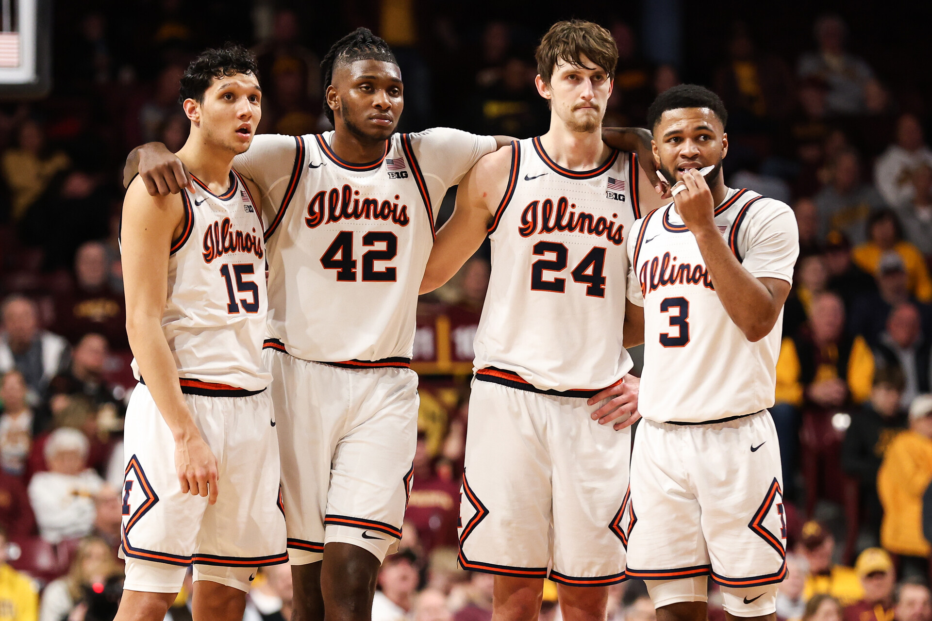 Jan 16, 2023; Minneapolis, Minnesota, USA; Illinois Fighting Illini guard RJ Melendez (15), forward Dain Dainja (42), forward Matthew Mayer (24), and guard Jayden Epps (3) looks on during the second half against the Minnesota Golden Gophers at Williams Arena.