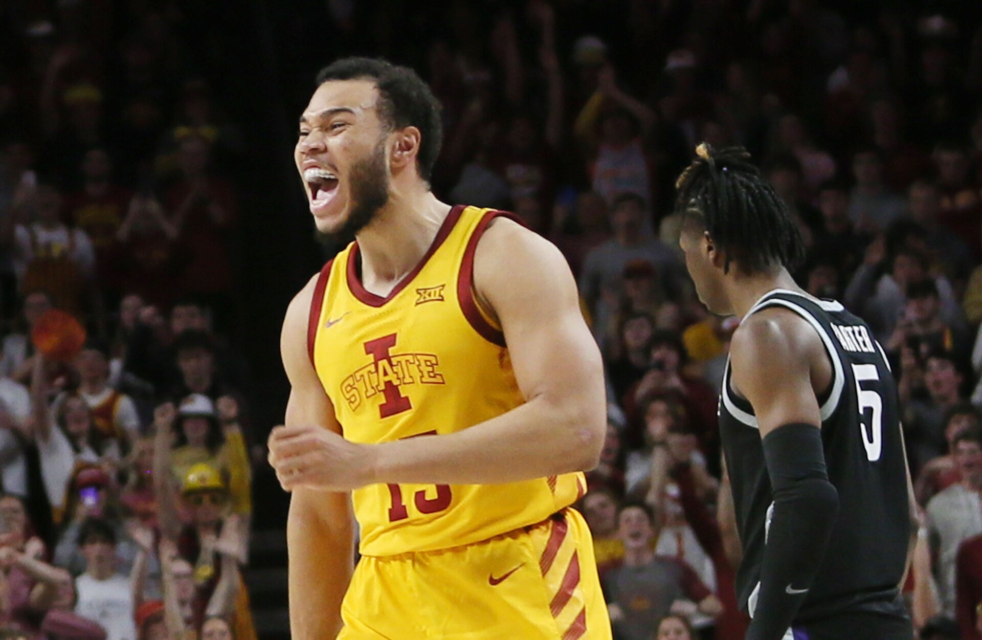Iowa State University Cyclones guard Jaren Holmes (13) celebrates after winning 80-76 over Kansas State at Hilton Coliseum Tuesday, 2023, in Ames, Iowa.