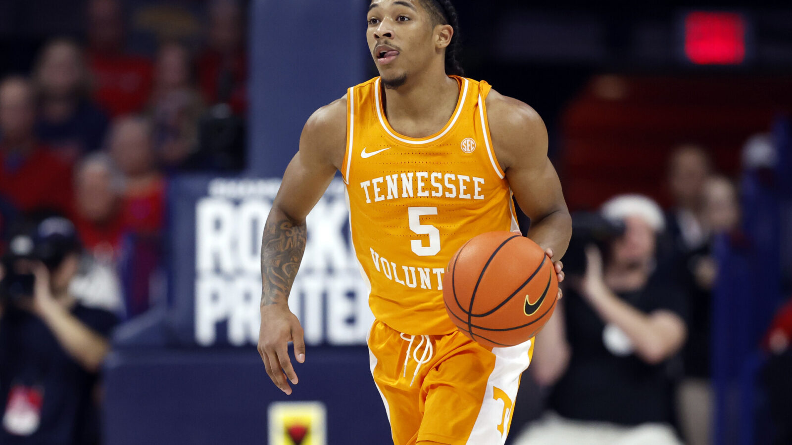 Zakai Zeigler #5 of the Tennessee Volunteers dribbles the ball up the floor during the second half against the Arizona Wildcats at McKale Center on December 17, 2022 in Tucson, Arizona. The Wildcats beat the Volunteers 75-70.