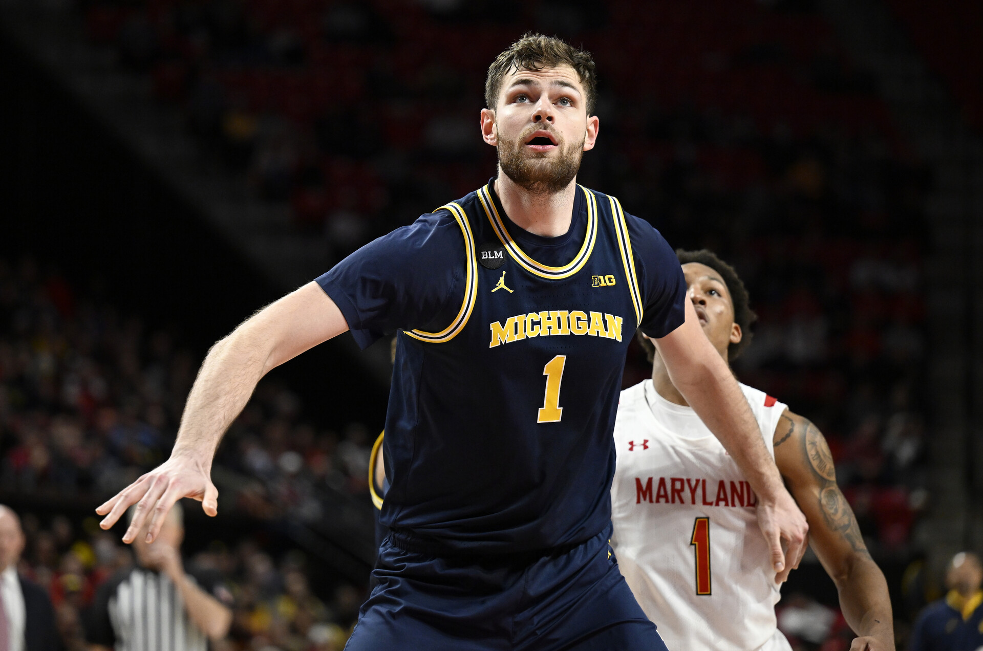 Hunter Dickinson #1 of the Michigan Wolverines boxes out against the Maryland Terrapins at Xfinity Center on January 19, 2023 in College Park, Maryland.