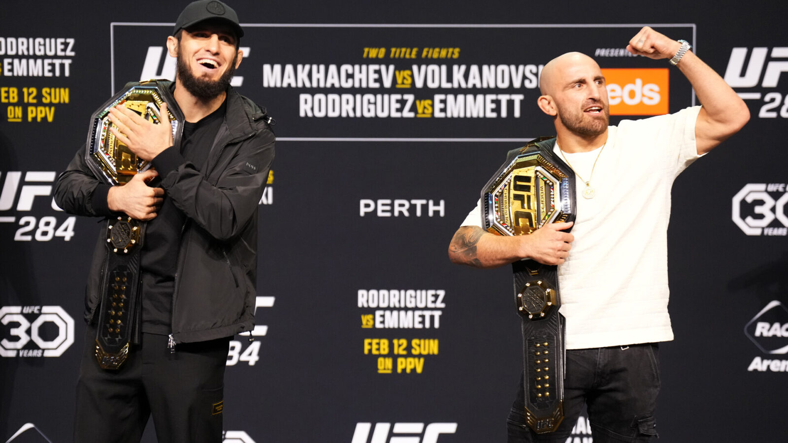 PERTH, AUSTRALIA - FEBRUARY 10: (L-R) Islam Makhachev of Russia and Alexander Volkanovski of Australia pose during the UFC 284 press conference at RAC Arena on February 10, 2023 in Perth, Australia.