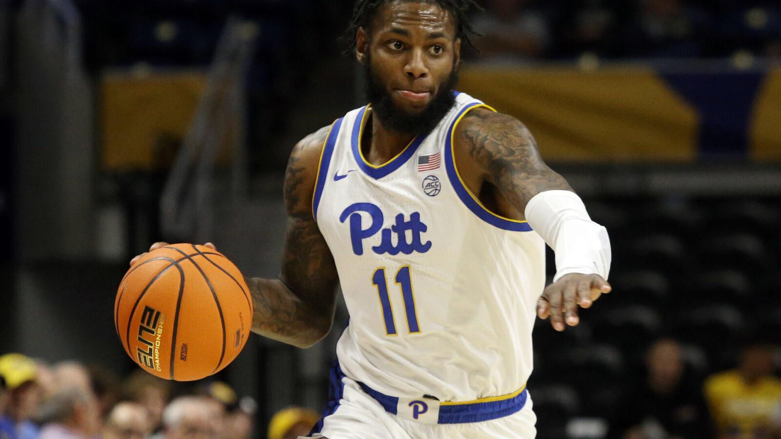 Pittsburgh Panthers guard Jamarius Burton (11) dribbles the ball against the Tennessee-Martin Skyhawks during the first half at the Petersen Events Center.