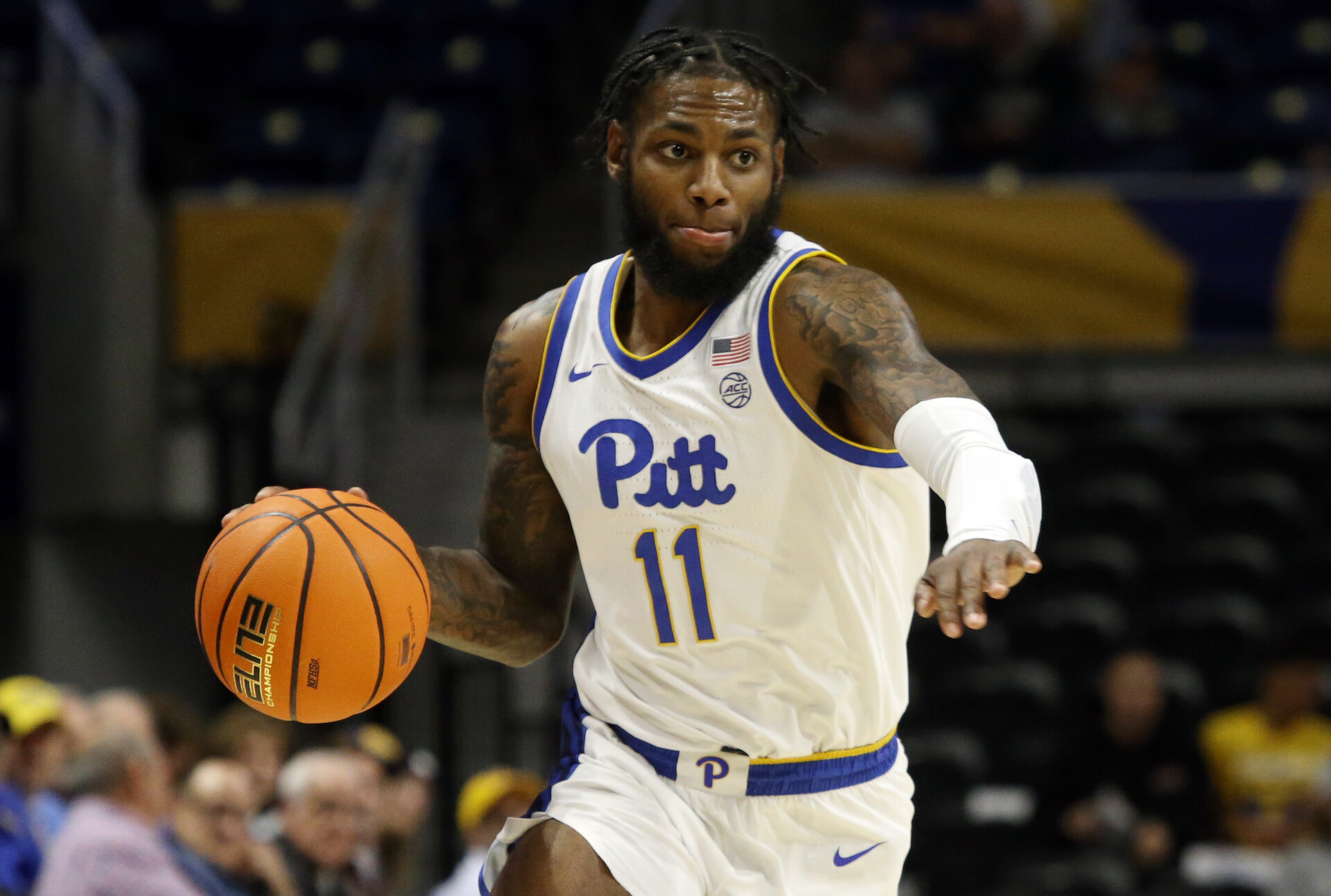 Pittsburgh Panthers guard Jamarius Burton (11) dribbles the ball against the Tennessee-Martin Skyhawks during the first half at the Petersen Events Center.