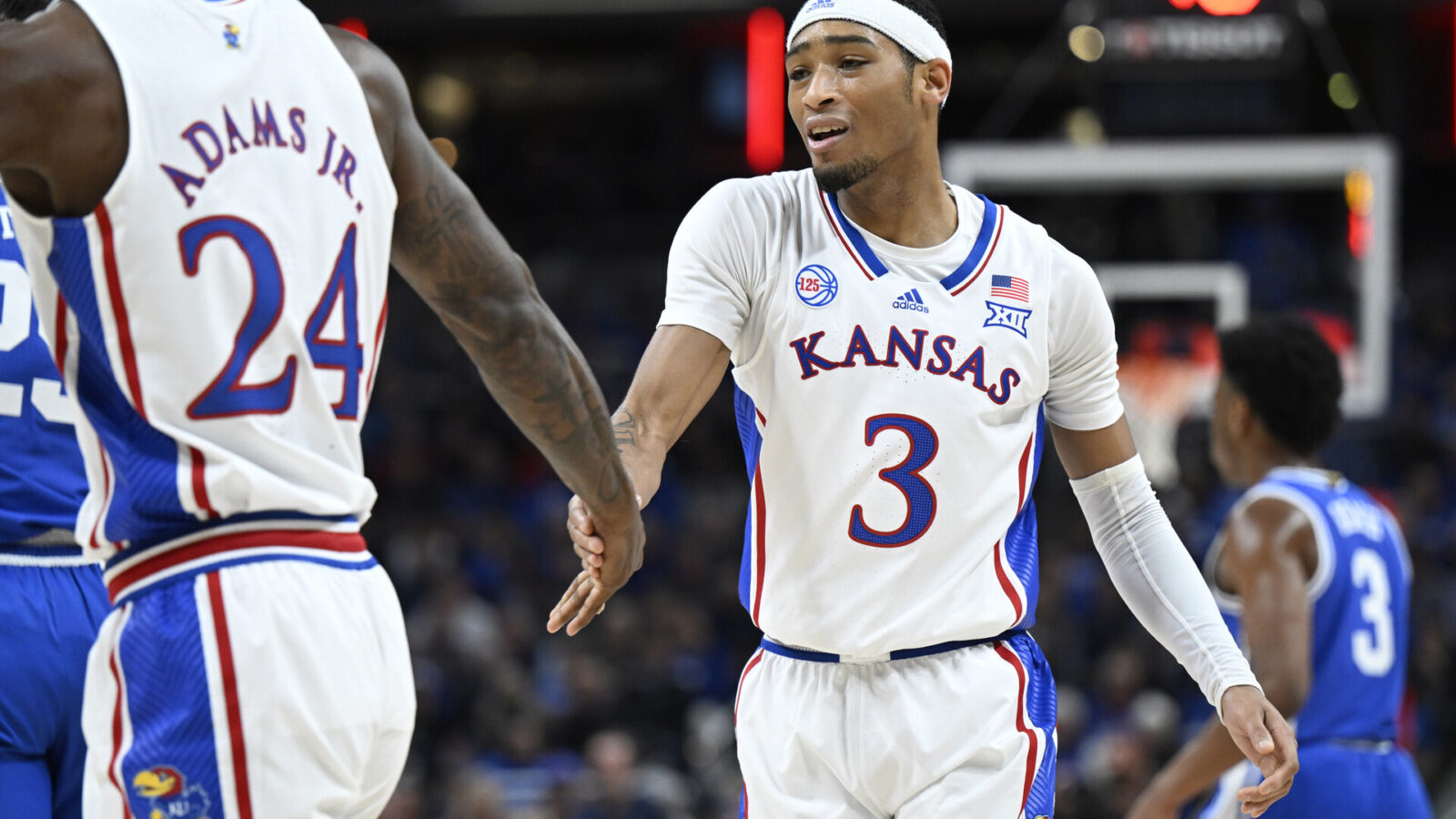 Kansas Jayhawks guard Dajuan Harris Jr. (3) high fives Kansas Jayhawks forward Jalen Wilson (10) during the first half against the Duke Blue Devils at Gainbridge Fieldhouse.