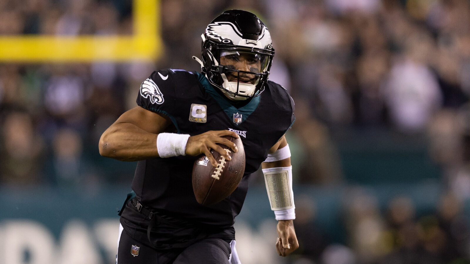 Philadelphia Eagles quarterback Jalen Hurts (1) runs the ball against the Green Bay Packers at Lincoln Financial Field.