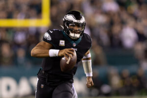 Philadelphia Eagles quarterback Jalen Hurts (1) runs the ball against the Green Bay Packers at Lincoln Financial Field.