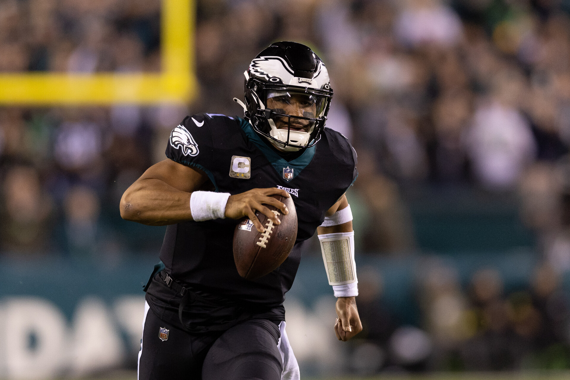 Philadelphia Eagles quarterback Jalen Hurts (1) runs the ball against the Green Bay Packers at Lincoln Financial Field.