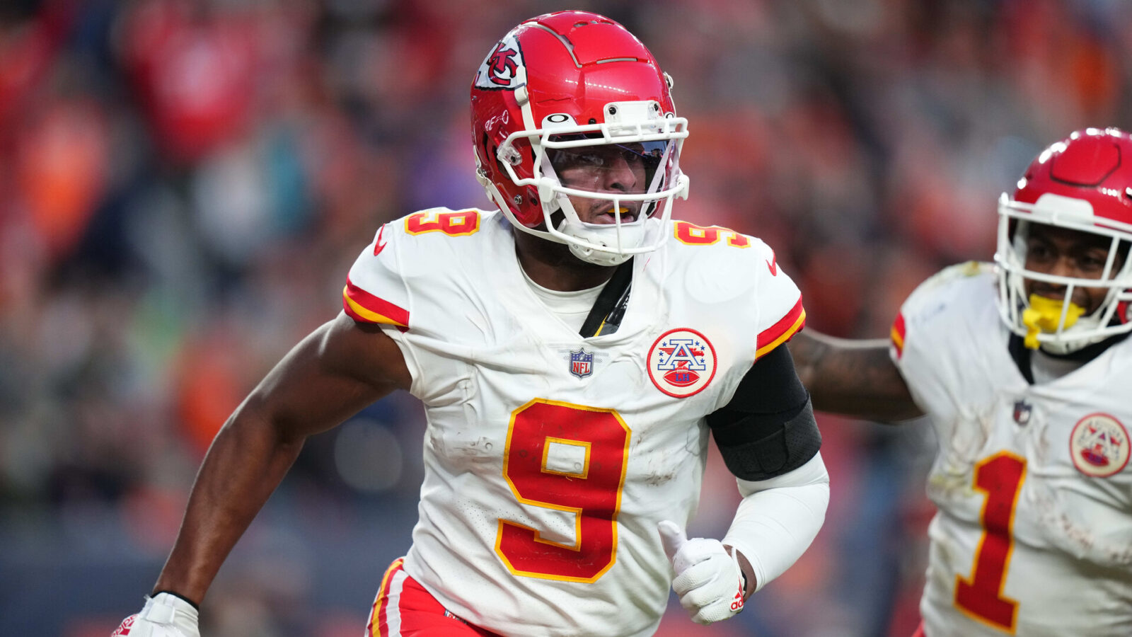 Kansas City Chiefs wide receiver JuJu Smith-Schuster (9) celebrates his touchdown reception in the third quarter against the Denver Broncos at Empower Field at Mile High.