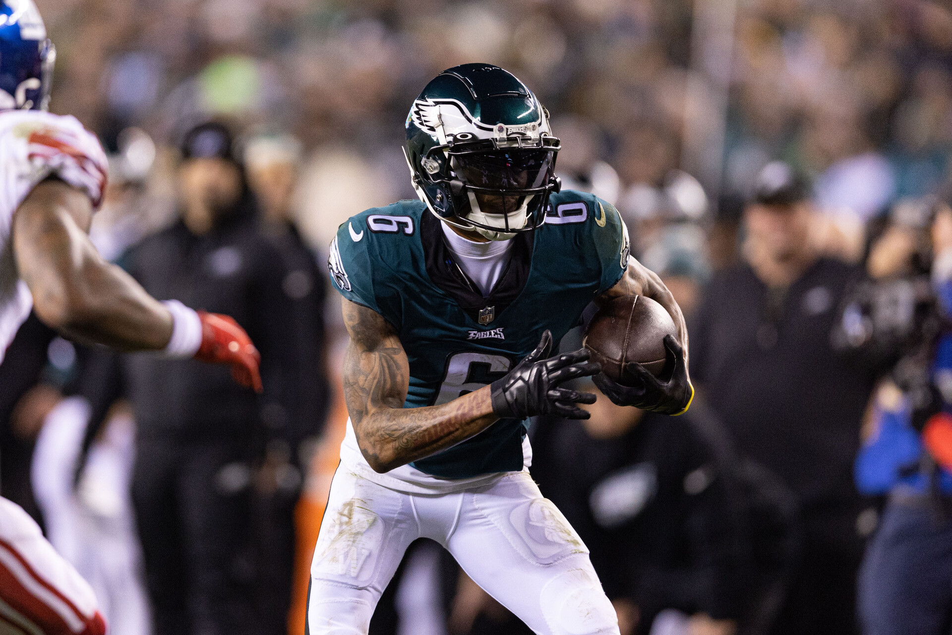 Jan 21, 2023; Philadelphia, Pennsylvania, USA; Philadelphia Eagles wide receiver DeVonta Smith (6) runs with the ball against the New York Giants during an NFC divisional round game at Lincoln Financial Field.