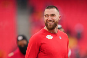 Kansas City Chiefs tight end Travis Kelce (87) looks on before the AFC Championship game between the Kansas City Chiefs and the Cincinnati Bengals at GEHA Field at Arrowhead Stadium.