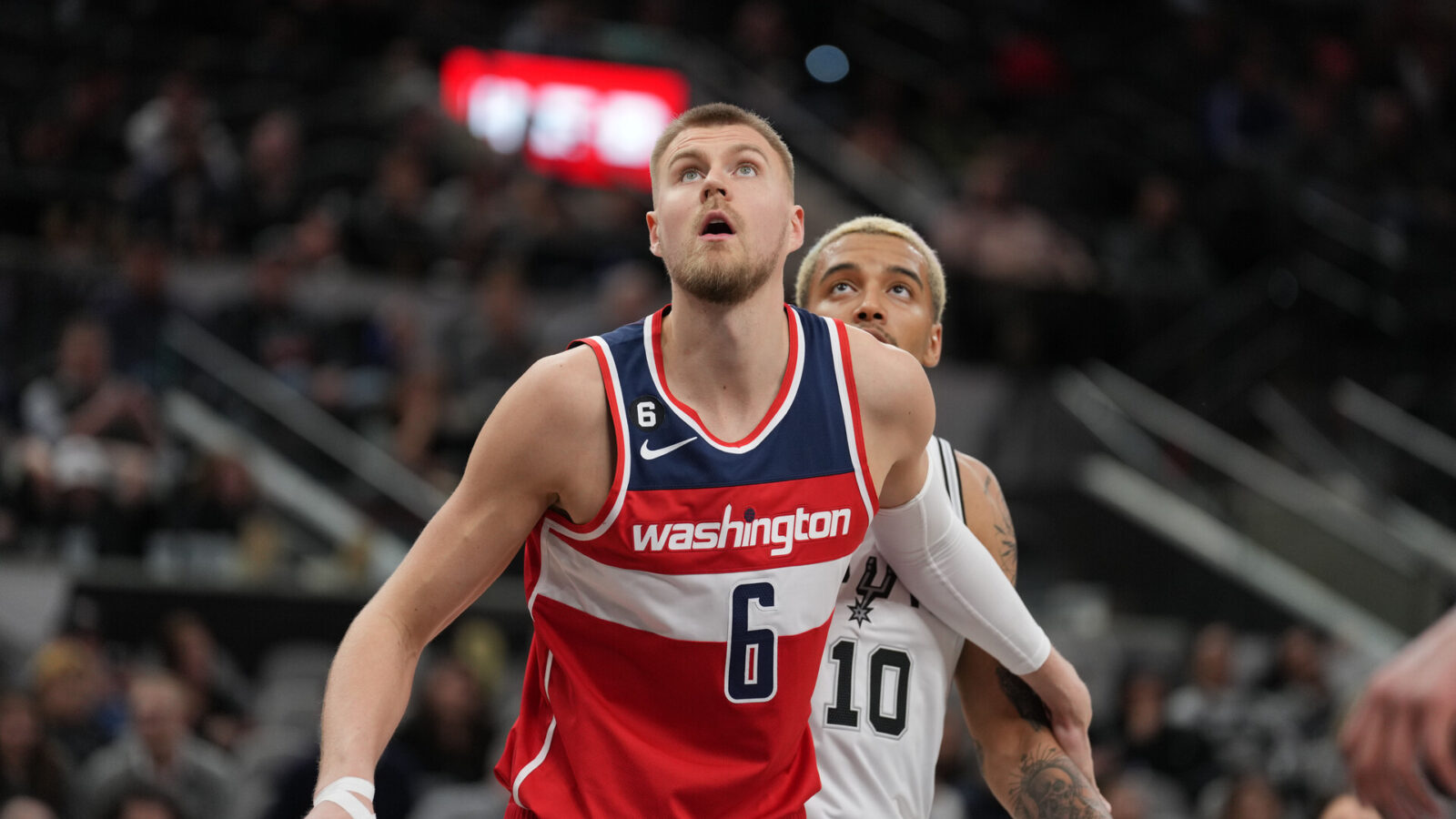 Jan 30, 2023; San Antonio, Texas, USA; Washington Wizards center Kristaps Porzingis (6) blocks out San Antonio Spurs forward Jeremy Sochan (10) in the second half at the AT&T Center.