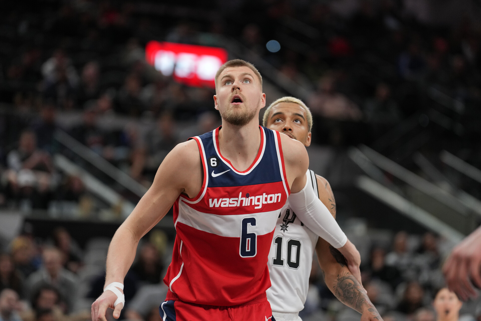 Jan 30, 2023; San Antonio, Texas, USA; Washington Wizards center Kristaps Porzingis (6) blocks out San Antonio Spurs forward Jeremy Sochan (10) in the second half at the AT&T Center.